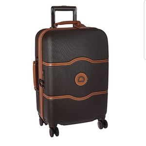 NIB Delsey Luggage 21" Carry On Spinner Suitcase